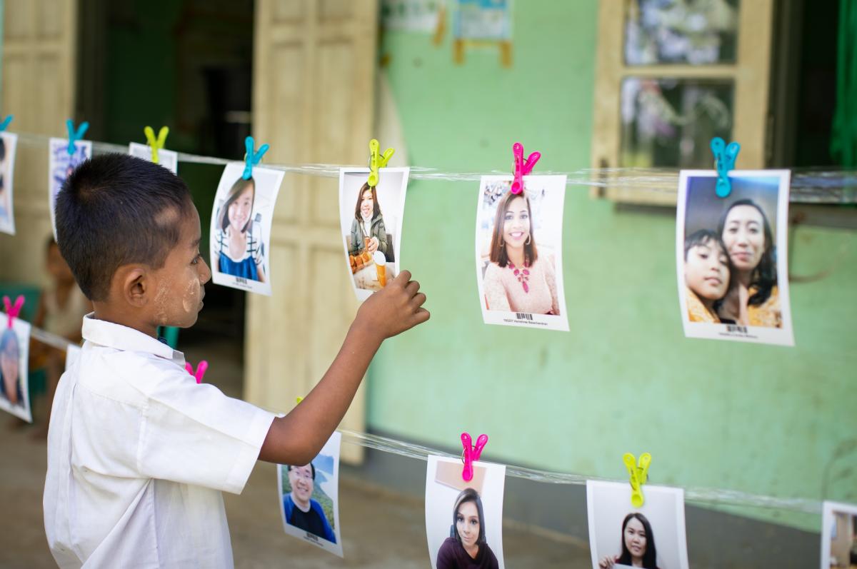 A child in Myanmar during the Choosing Party, trying to make his decision. 