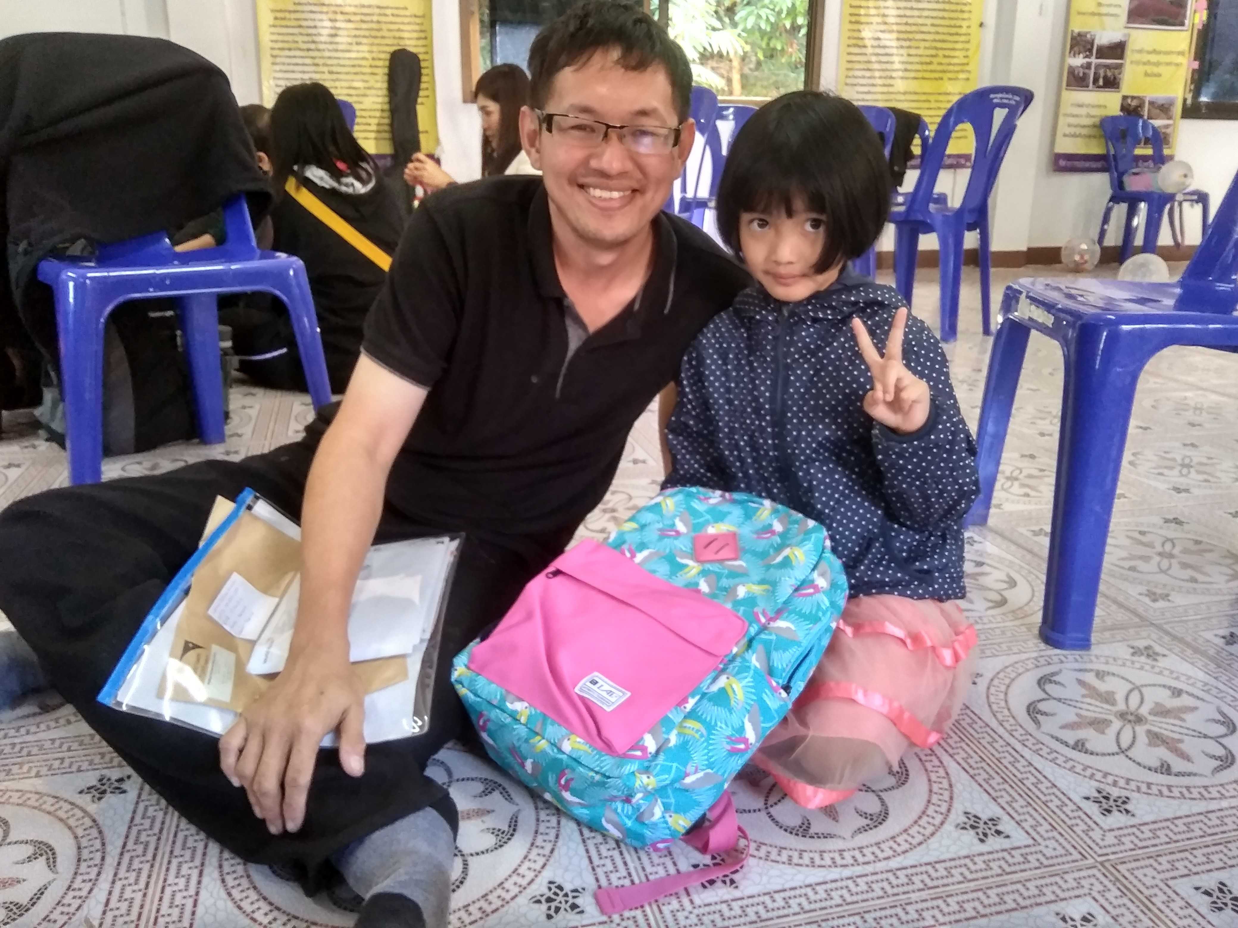 Chun Hian with his sponsored child