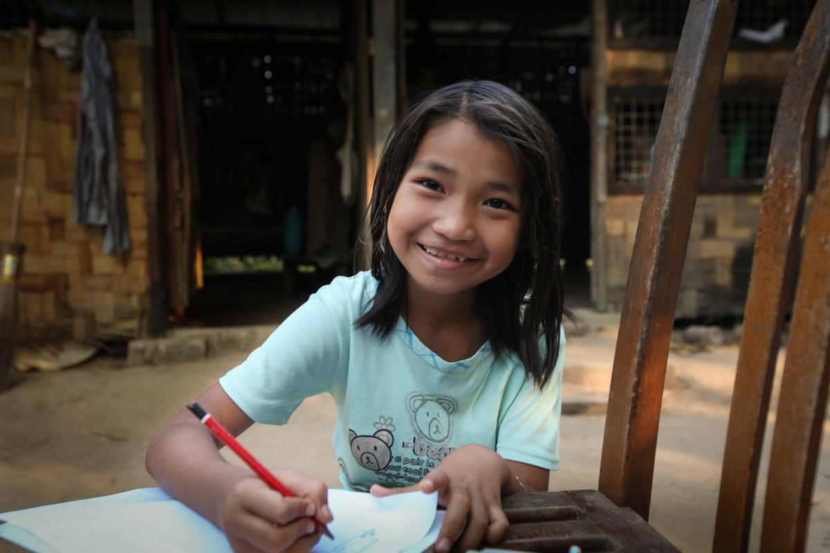 A Child Writing a Letter