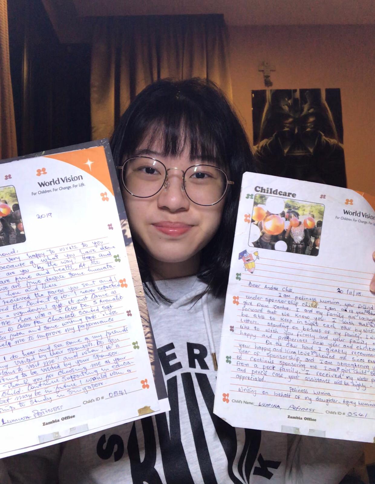 Andrea with reply letters from Petiness