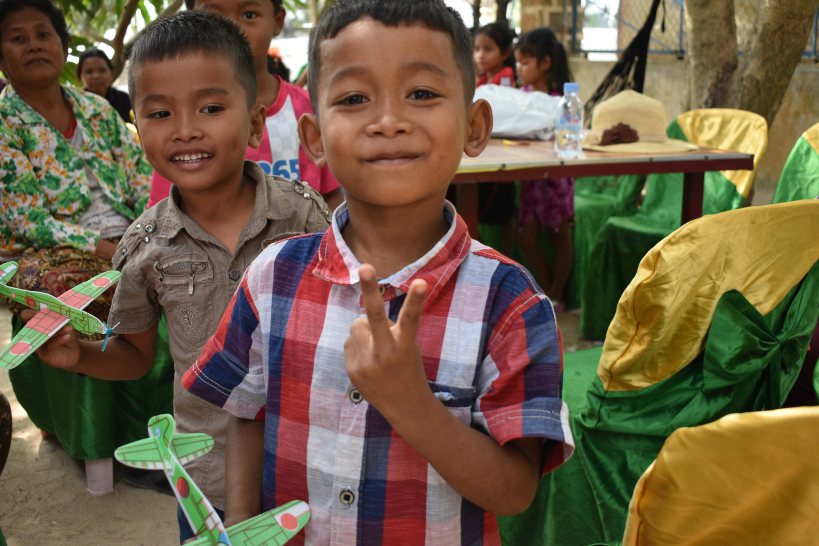 Cambodian boys with model airplanes 