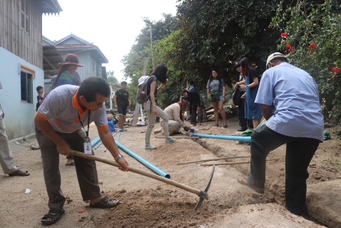 World Vision trippers carrying out work in the community