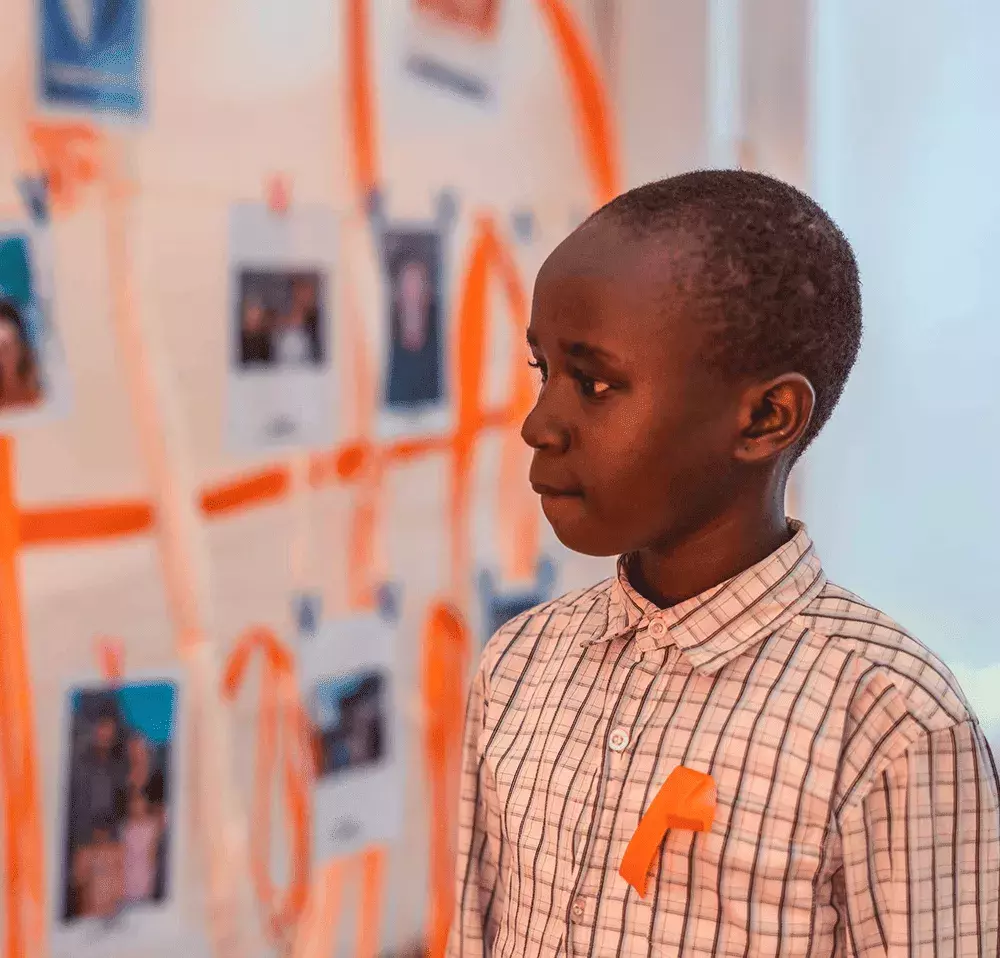 Child choosing sponsor photo at choosing party