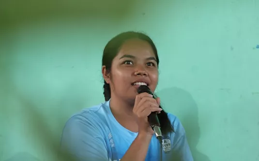 Youth leader sharing the impact of child sponsorship