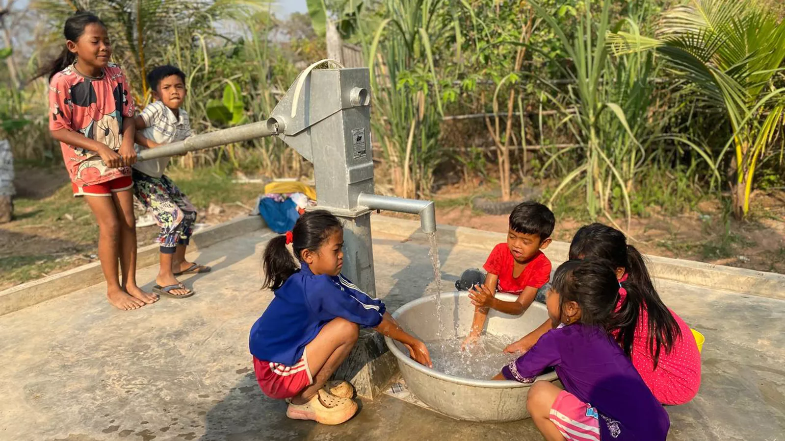 Children having access to clean water in Cambodia