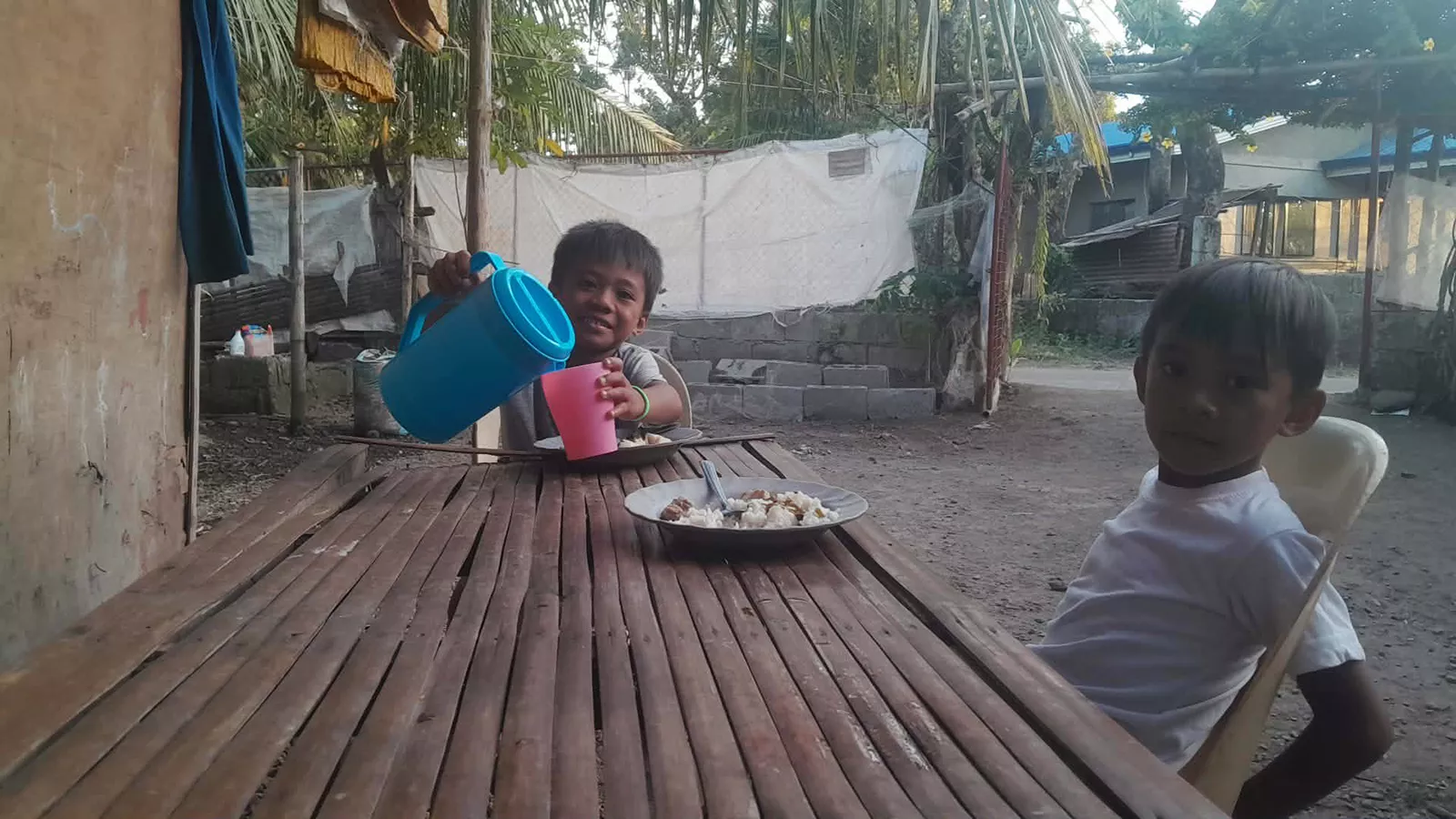 6-year-old Kurt having a cup of clean water