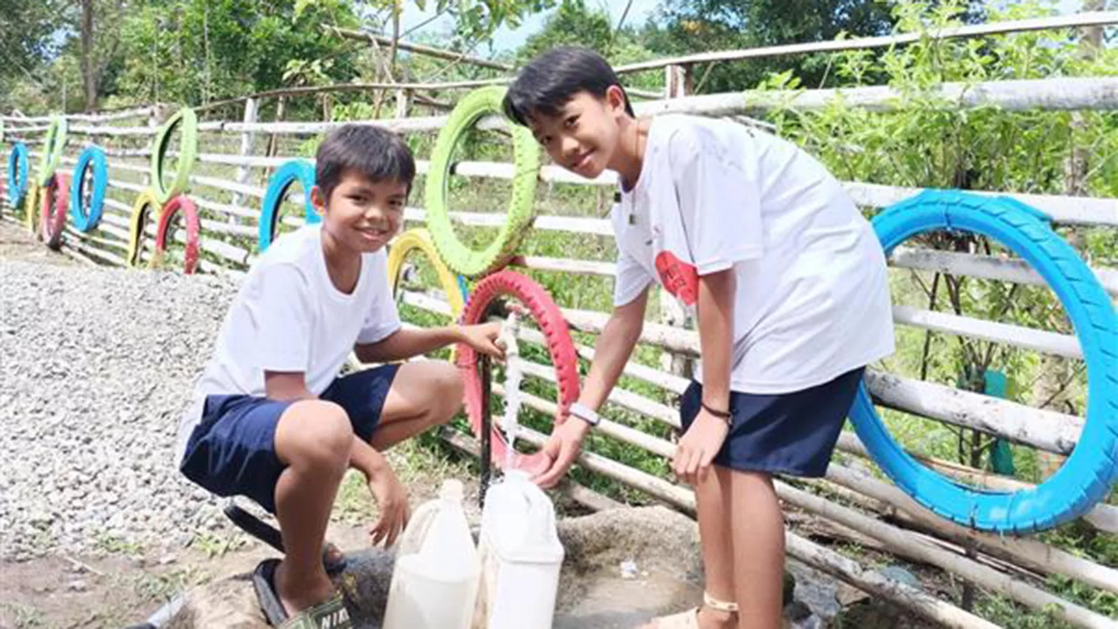 11-year-old Clarence collecting clean water