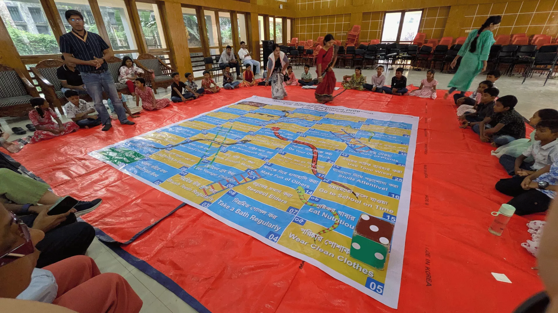 A snakes and ladders game played by our World Vision Singapore sponsors and children in our Wazirpur ADP.