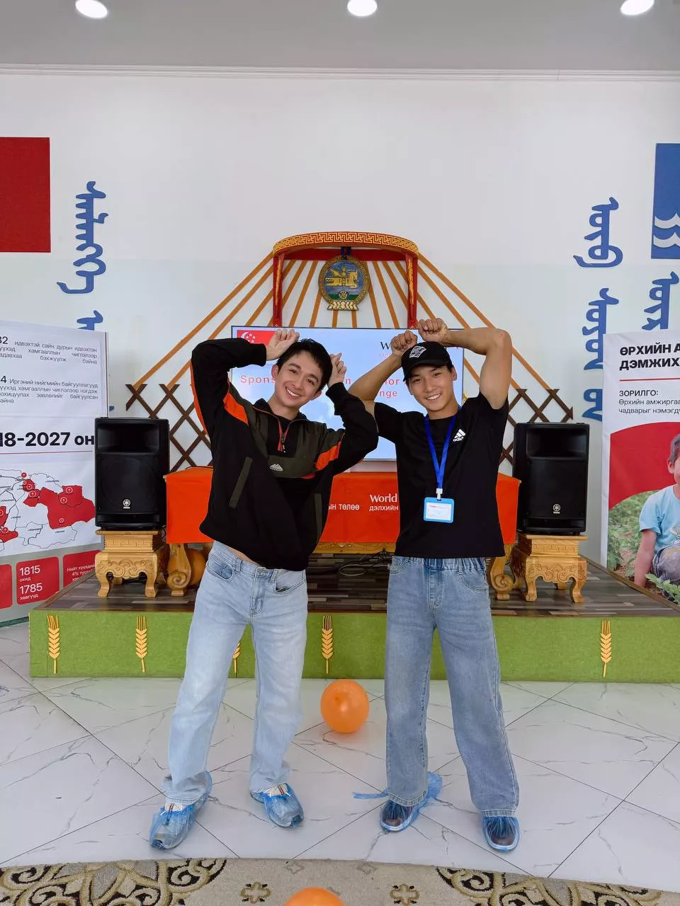 Guan Wei, World Vision Singapore child sponsor with his sponsored child in Selenge, Mongolia