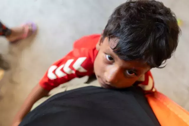 A child who survived the flash floods in Nepal