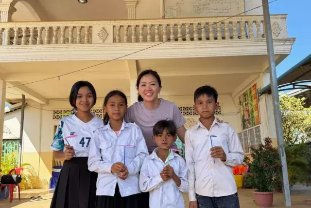 World Vision Singapore Goodwill Ambassador Fynn Sor with her sponsored children from Sambour ADP