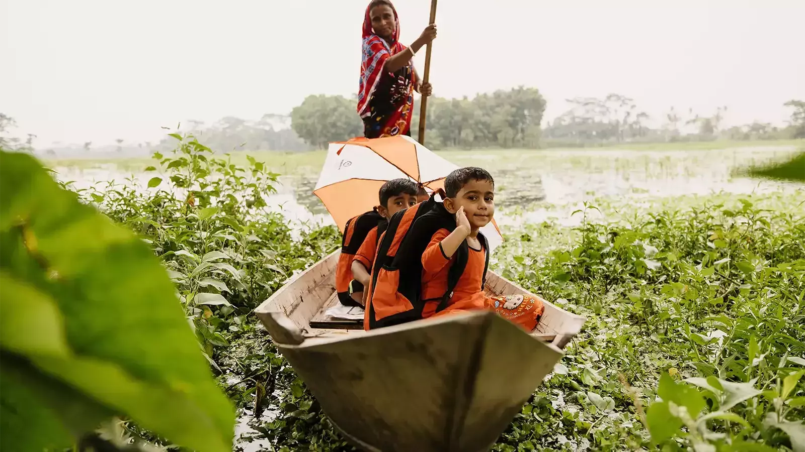 Children on a boat in Wazirpur Bangladesh