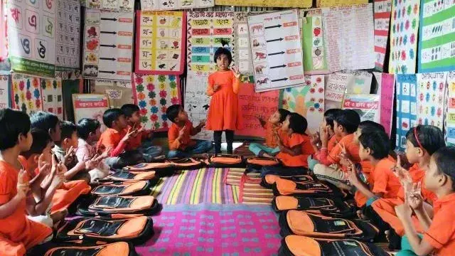 children in Wazirpur learning literacy skills