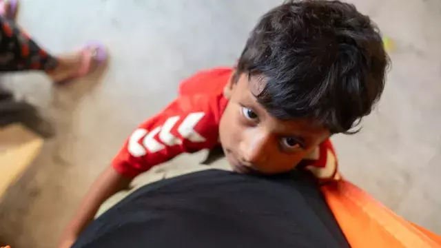 A child who survived the flash floods in Nepal