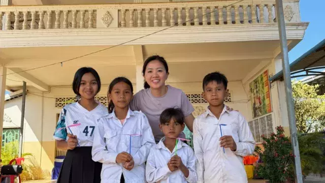 World Vision Singapore Goodwill Ambassador Fynn Sor with her sponsored children from Sambour ADP