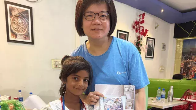Carmen Low, World Vision Child Sponsor, with her sponsored child in Wazirpur Bangladesh